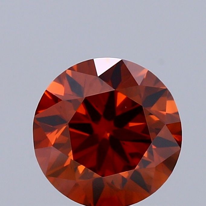 Loose Diamond - ROUND 1.0ct Fancy Deep Orange VS1: Loose Diamond - ROUND 1.0ct Fancy Deep Orange VS1 Source: This is a real non-mined Diamond that has been grown in a lab Shape: ROUND Carats: 1.0 Color: Fancy Deep Orange Certification: IGI Video: