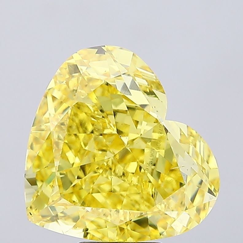 Loose Diamond - HEART 10.09ct Fancy Vivid Yellow VS2: Loose Diamond - HEART 10.09ct Fancy Vivid Yellow VS2 Source: This is a real non-mined Diamond that has been grown in a lab Shape: HEART Carats: 10.09 Color: Fancy Vivid Yellow Certification: IGI Video
