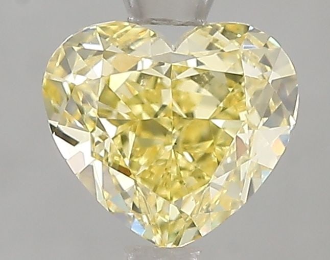 Loose Diamond - HEART 1.52ct Fancy Intense Yellow VS1: Loose Diamond - HEART 1.52ct Fancy Intense Yellow VS1 Source: This is a real non-mined Diamond that has been grown in a lab Shape: HEART Carats: 1.52 Color: Fancy Intense Yellow Certification: IGI Vid