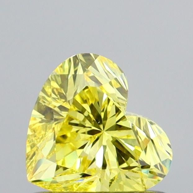 Loose Diamond - HEART 0.66ct Fancy Vivid Yellow SI2: Loose Diamond - HEART 0.66ct Fancy Vivid Yellow SI2 Source: This is a real non-mined Diamond that has been grown in a lab Shape: HEART Carats: 0.66 Color: Fancy Vivid Yellow Certification: IGI Video: