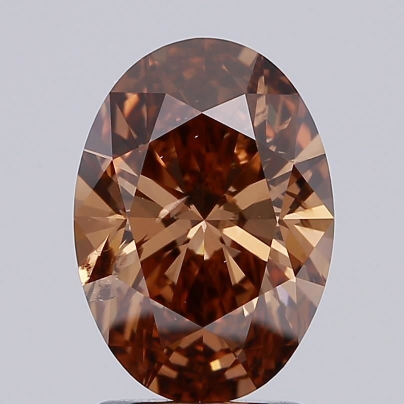 Loose Diamond - OVAL 1.81ct Fancy Deep Brown SI2: Loose Diamond - OVAL 1.81ct Fancy Deep Brown SI2 Source: This is a real non-mined Diamond that has been grown in a lab Shape: OVAL Carats: 1.81 Color: Fancy Deep Brown Certification: IGI Video: