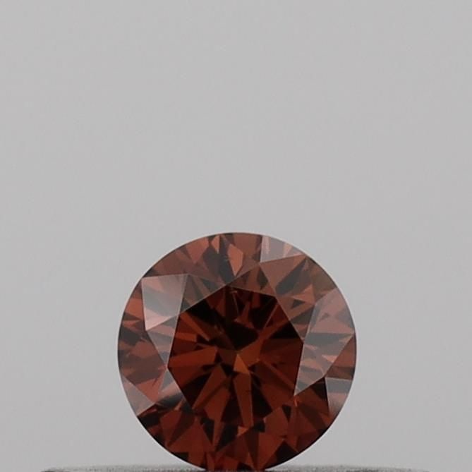 Loose Diamond - ROUND 0.18ct Fancy Vivid Orange VS2: Loose Diamond - ROUND 0.18ct Fancy Vivid Orange VS2 Source: This is a real non-mined Diamond that has been grown in a lab Shape: ROUND Carats: 0.18 Color: Fancy Vivid Orange Certification: IGI Video: