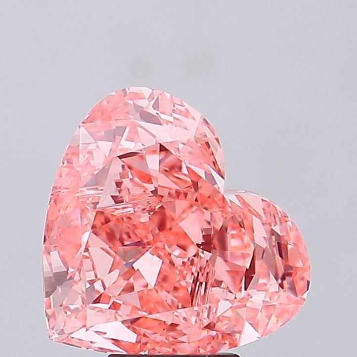 Loose Diamond - HEART 6.75ct Fancy Vivid Pink VS1: Loose Diamond - HEART 6.75ct Fancy Vivid Pink VS1 Source: This is a real non-mined Diamond that has been grown in a lab Shape: HEART Carats: 6.75 Color: Fancy Vivid Pink Certification: IGI Video: