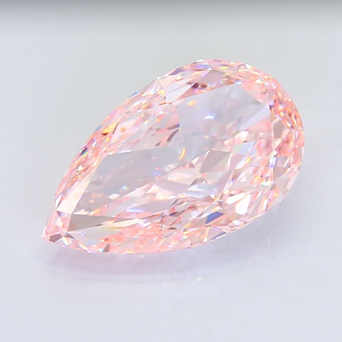 Loose Diamond - PEAR 15.75ct Fancy Intense Pink VVS2: Loose Diamond - PEAR 15.75ct Fancy Intense Pink VVS2 Source: This is a real non-mined Diamond that has been grown in a lab Shape: PEAR Carats: 15.75 Color: Fancy Intense Pink Certification: IGI Video: