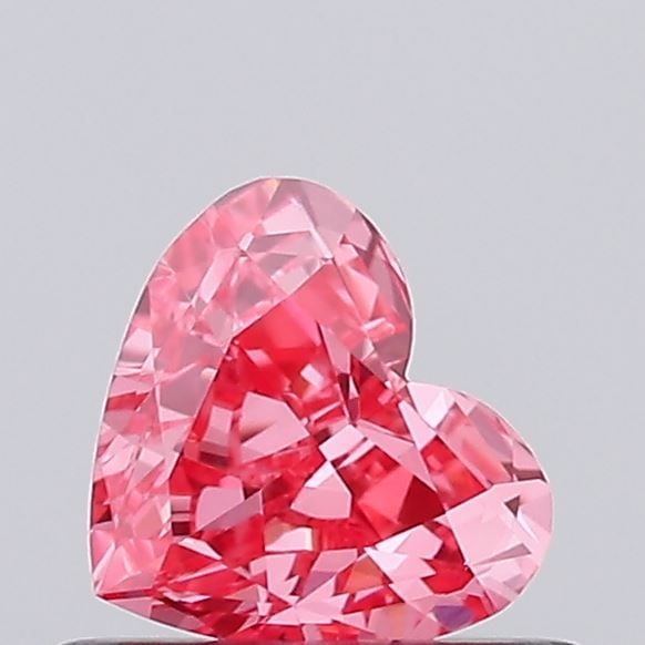 Loose Diamond - HEART 0.41ct Fancy Vivid Pink VVS2: Loose Diamond - HEART 0.41ct Fancy Vivid Pink VVS2 Source: This is a real non-mined Diamond that has been grown in a lab Shape: HEART Carats: 0.41 Color: Fancy Vivid Pink Certification: IGI Video: