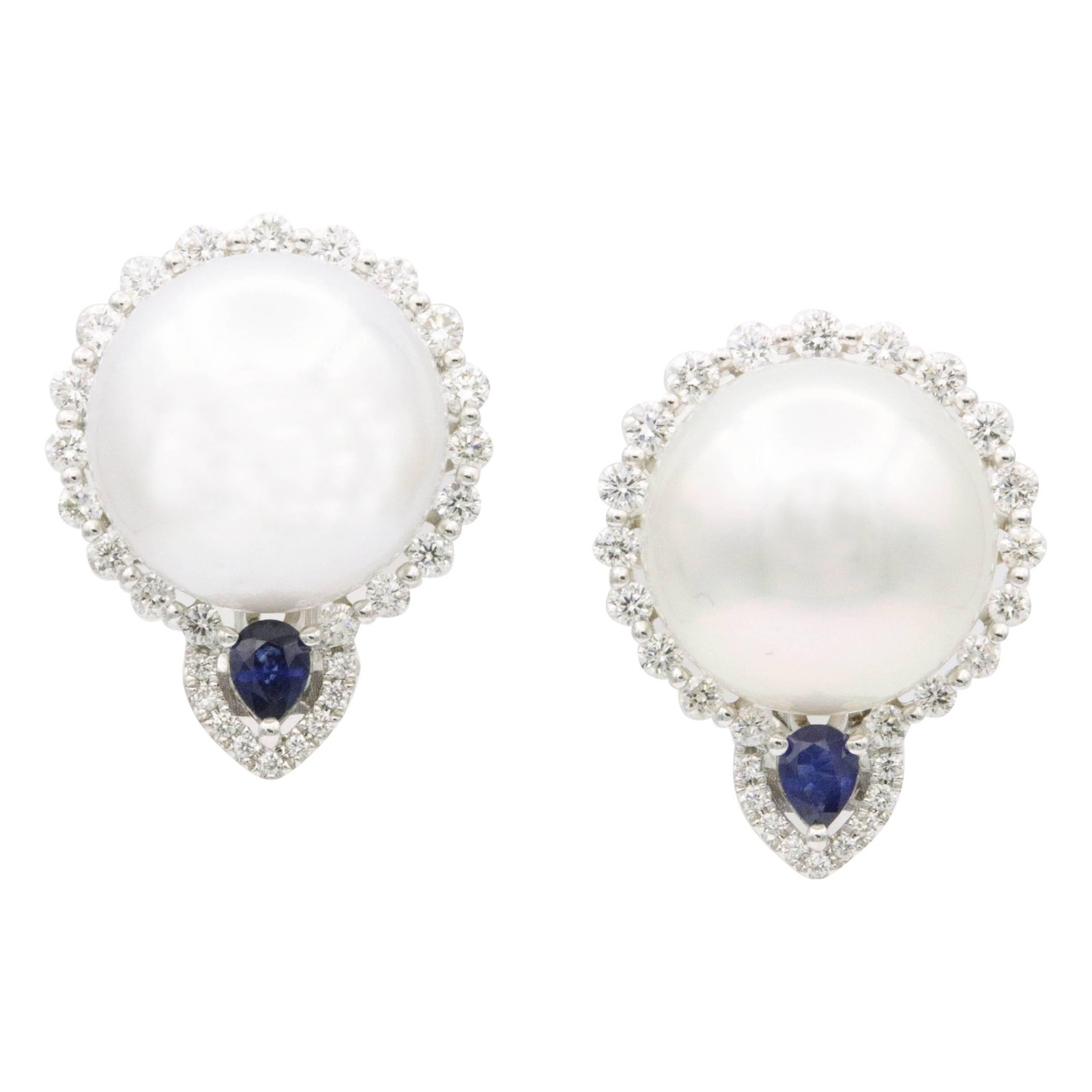 Harbor Diamonds 18k White Gold South Sea Pearl Diamond Earrings: Harbor Diamonds 18k White Gold South Sea Pearl Diamond Earrings Elevate your elegance with these stunning South Sea Pearl and Diamond Stud Earrings, featuring a captivating blue sapphire accent. Craft