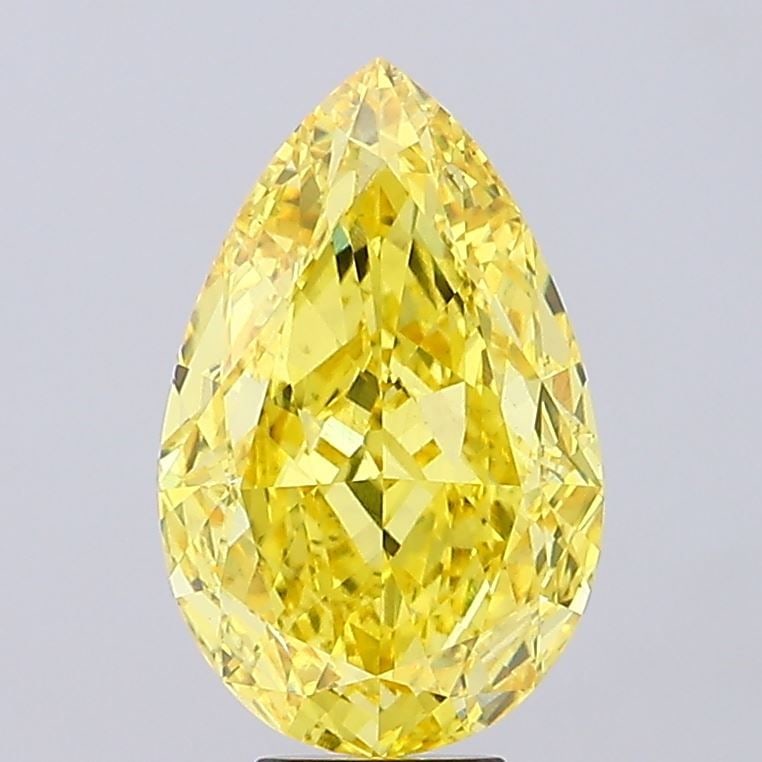 Loose Diamond - PEAR 8.65ct Fancy Vivid Yellow VS1: Loose Diamond - PEAR 8.65ct Fancy Vivid Yellow VS1 Source: This is a real non-mined Diamond that has been grown in a lab Shape: PEAR Carats: 8.65 Color: Fancy Vivid Yellow Certification: IGI Video: