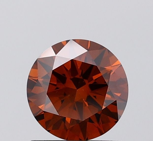 Loose Diamond - ROUND 1.01ct Fancy Deep Brown VS2: Loose Diamond - ROUND 1.01ct Fancy Deep Brown VS2 Source: This is a real non-mined Diamond that has been grown in a lab Shape: ROUND Carats: 1.01 Color: Fancy Deep Brown Certification: IGI Video: