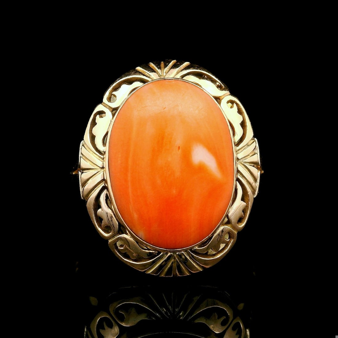 Vintage 14k Yellow Gold Coral Cabochon Floral Cocktail Ring: Vintage 14k Yellow Gold Coral Cabochon Floral Cocktail Ring Experience the elegance of this vintage cocktail ring, crafted from solid 14k yellow gold. The ring features a stunning natural genuine cora