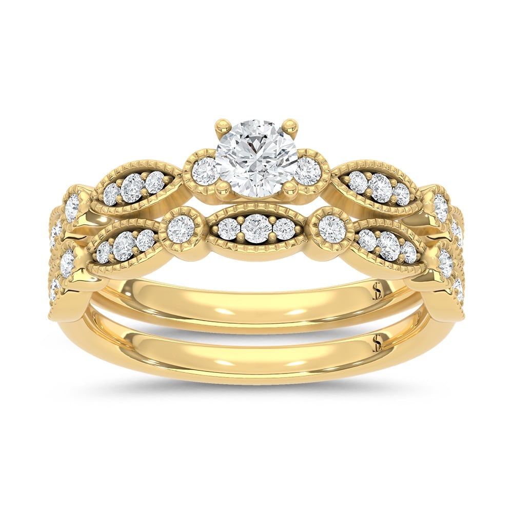 Diamond 1/2 Ct.Tw. Bridal Ring in 14K White Gold: Diamond 1/2 Ct.Tw. Bridal Ring in 14K White Gold 14k Yellow Gold Stone Color: G-h Stone Clarity: Si2 Each ring is presented in standard size 6.5. Complimentary resizing is available between sizes 510 