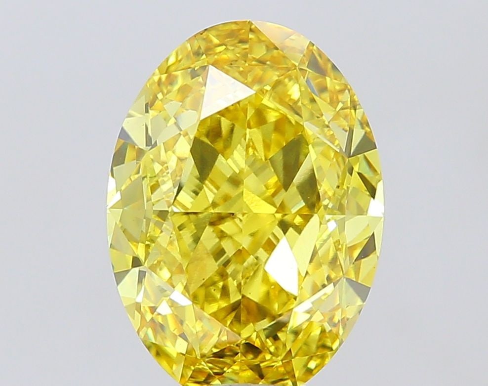 Loose Diamond - OVAL 8.0ct Fancy Vivid Yellow VS2: Loose Diamond - OVAL 8.0ct Fancy Vivid Yellow VS2 Source: This is a real non-mined Diamond that has been grown in a lab Shape: OVAL Carats: 8.0 Color: Fancy Vivid Yellow Certification: IGI Video:
