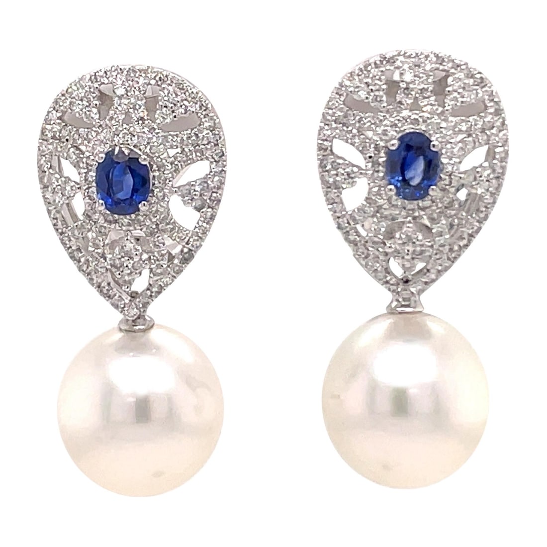 Harbor Diamonds Sapphire Diamond South Sea Pearl Earrings 18K White Gold: Harbor Diamonds Sapphire Diamond South Sea Pearl Earrings 18K White Gold Elevate your elegance with these stunning drop earrings crafted from 18 karat white gold. Each earring features two captivating