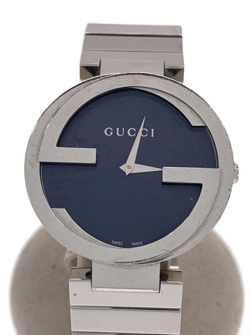 Gucci Interlocking stainless steel quartz men's wristwatch: Gucci Interlocking stainless steel quartz men's wristwatch This GUCCI Interlocking Quartz 133.3 men's wristwatch features a sophisticated black dial and a durable stainless steel case and band. Design