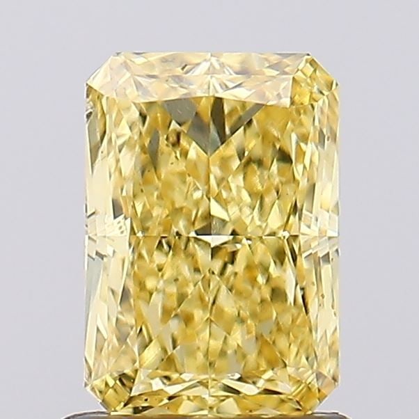 Loose Diamond - RADIANT 1.06ct Fancy Vivid Yellow VS1: Loose Diamond - RADIANT 1.06ct Fancy Vivid Yellow VS1 Source: This is a real non-mined Diamond that has been grown in a lab Shape: RADIANT Carats: 1.06 Color: Fancy Vivid Yellow Certification: IGI Vid