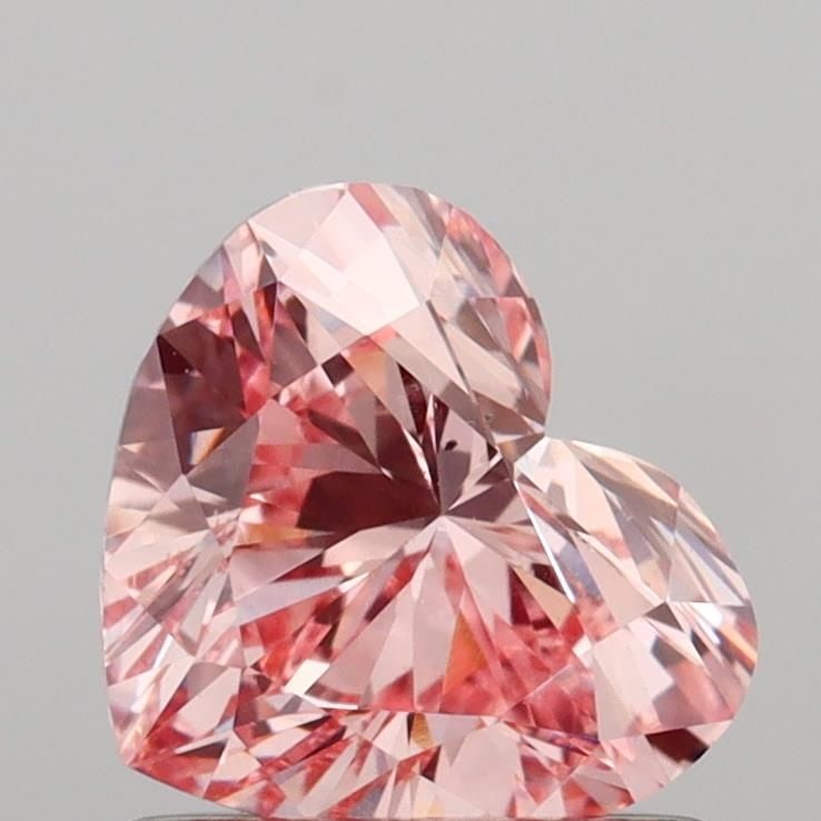 Loose Diamond - HEART 0.98ct Fancy Vivid Pink VS2: Loose Diamond - HEART 0.98ct Fancy Vivid Pink VS2 Source: This is a real non-mined Diamond that has been grown in a lab Shape: HEART Carats: 0.98 Color: Fancy Vivid Pink Certification: IGI Video: