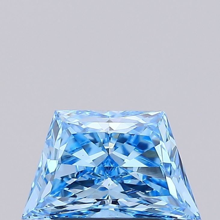 Loose Diamond - TRAPEZOID 1.07ct Fancy Vivid Blue VS1: Loose Diamond - TRAPEZOID 1.07ct Fancy Vivid Blue VS1 Source: This is a real non-mined Diamond that has been grown in a lab Shape: TRAPEZOID Carats: 1.07 Color: Fancy Vivid Blue Certification: IGI Vid
