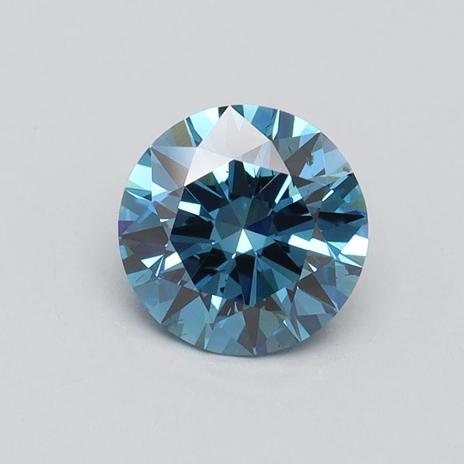 Loose Diamond - ROUND 1.02ct Fancy Vivid Blue SI1: Loose Diamond - ROUND 1.02ct Fancy Vivid Blue SI1 Source: This is a real non-mined Diamond that has been grown in a lab Shape: ROUND Carats: 1.02 Color: Fancy Vivid Blue Certification: IGI Video:
