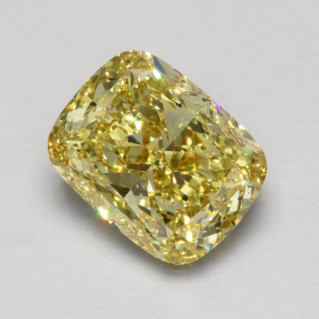 Loose Diamond - CUSHION MODIFIED 12.81ct Fancy Vivid Yellow VS1: Loose Diamond - CUSHION MODIFIED 12.81ct Fancy Vivid Yellow VS1 Source: This is a real non-mined Diamond that has been grown in a lab Shape: CUSHION MODIFIED Carats: 12.81 Color: Fancy Vivid Yellow Ce