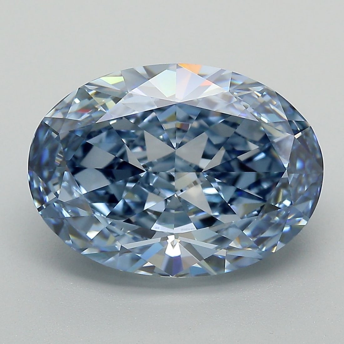 Loose Diamond - OVAL 6.6ct Fancy Vivid Blue VVS1: Loose Diamond - OVAL 6.6ct Fancy Vivid Blue VVS1 Source: This is a real non-mined Diamond that has been grown in a lab Shape: OVAL Carats: 6.6 Color: Fancy Vivid Blue Certification: IGI Video: