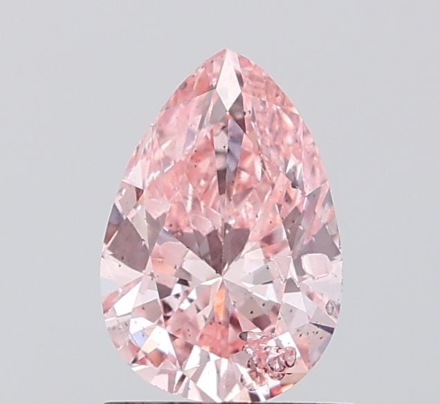 Loose Diamond - PEAR 1.0ct Fancy Vivid Pink I2: Loose Diamond - PEAR 1.0ct Fancy Vivid Pink I2 Source: This is a real non-mined Diamond that has been grown in a lab Shape: PEAR Carats: 1.0 Color: Fancy Vivid Pink Certification: IGI Video: