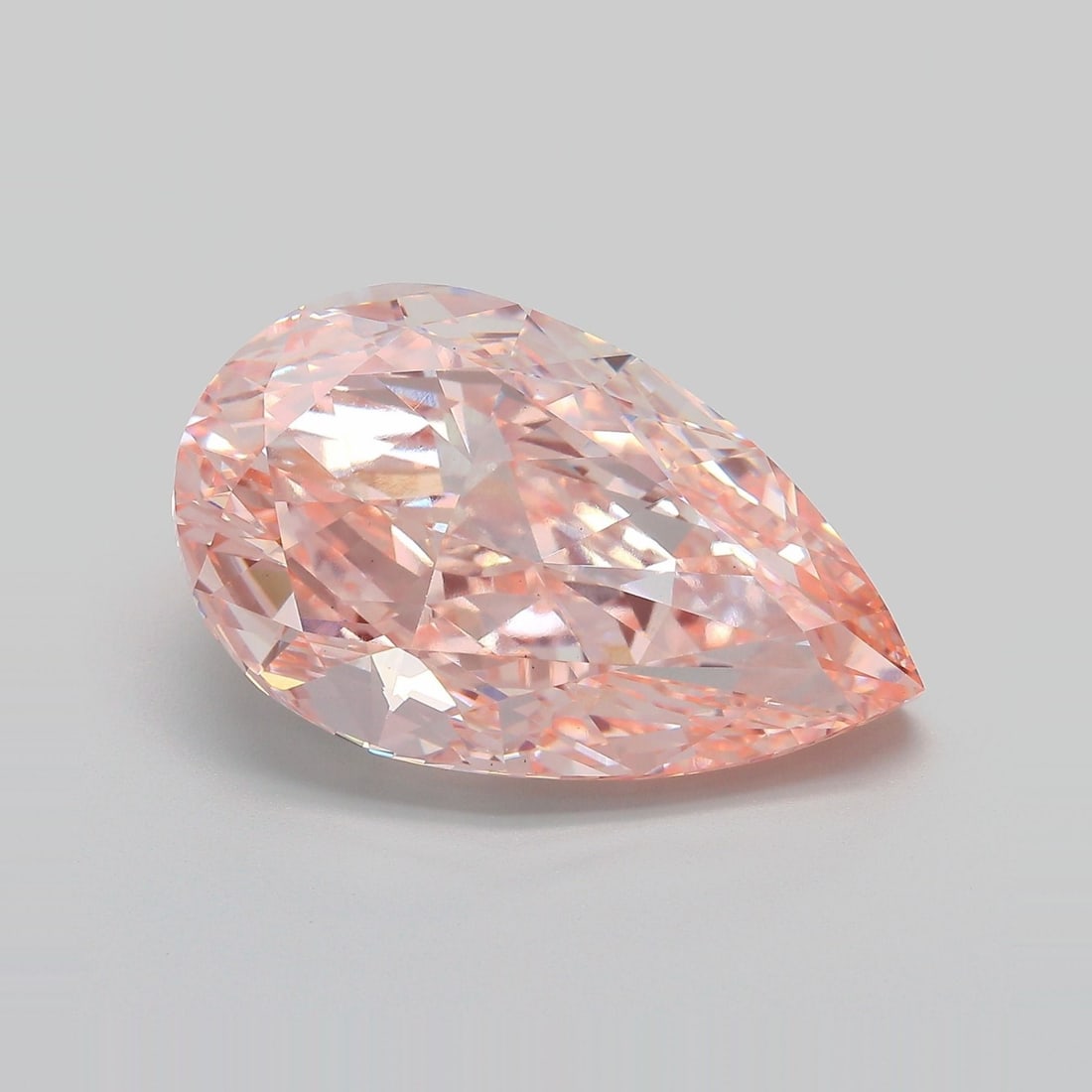 Loose Diamond - PEAR 15.08ct Fancy Vivid Pink VS1: Loose Diamond - PEAR 15.08ct Fancy Vivid Pink VS1 Source: This is a real non-mined Diamond that has been grown in a lab Shape: PEAR Carats: 15.08 Color: Fancy Vivid Pink Certification: IGI Video: