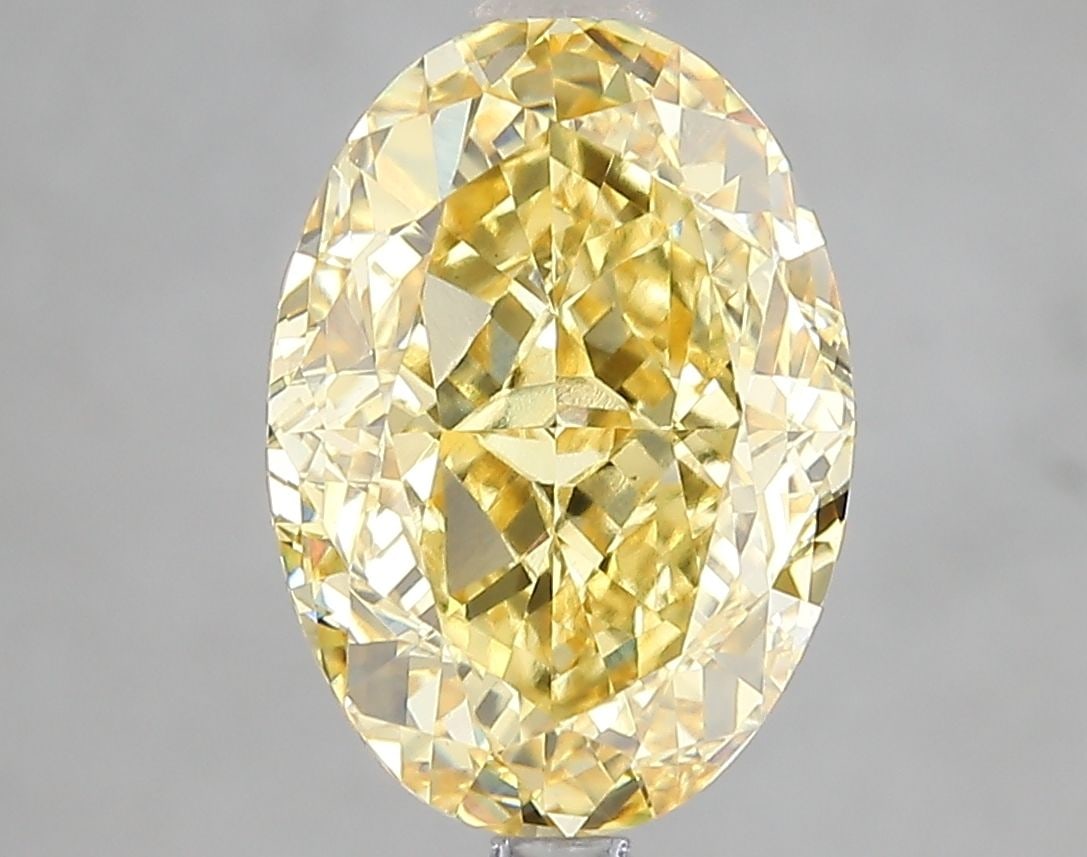 Loose Diamond - OVAL 4.54ct Fancy Vivid Yellow VS1: Loose Diamond - OVAL 4.54ct Fancy Vivid Yellow VS1 Source: This is a real non-mined Diamond that has been grown in a lab Shape: OVAL Carats: 4.54 Color: Fancy Vivid Yellow Certification: IGI Video: