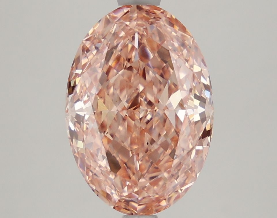 Loose Diamond - OVAL 3.15ct Fancy Vivid Pink VS2: Loose Diamond - OVAL 3.15ct Fancy Vivid Pink VS2 Source: This is a real non-mined Diamond that has been grown in a lab Shape: OVAL Carats: 3.15 Color: Fancy Vivid Pink Certification: IGI Video: