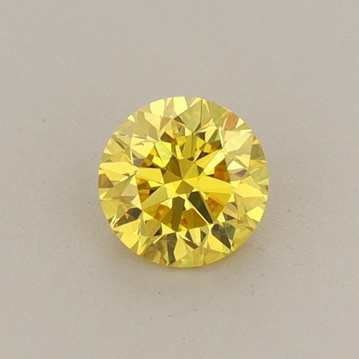 Loose Diamond - ROUND 0.38ct Fancy Vivid Yellow VVS2: Loose Diamond - ROUND 0.38ct Fancy Vivid Yellow VVS2 Source: This is a real non-mined Diamond that has been grown in a lab Shape: ROUND Carats: 0.38 Color: Fancy Vivid Yellow Certification: IGI Video: