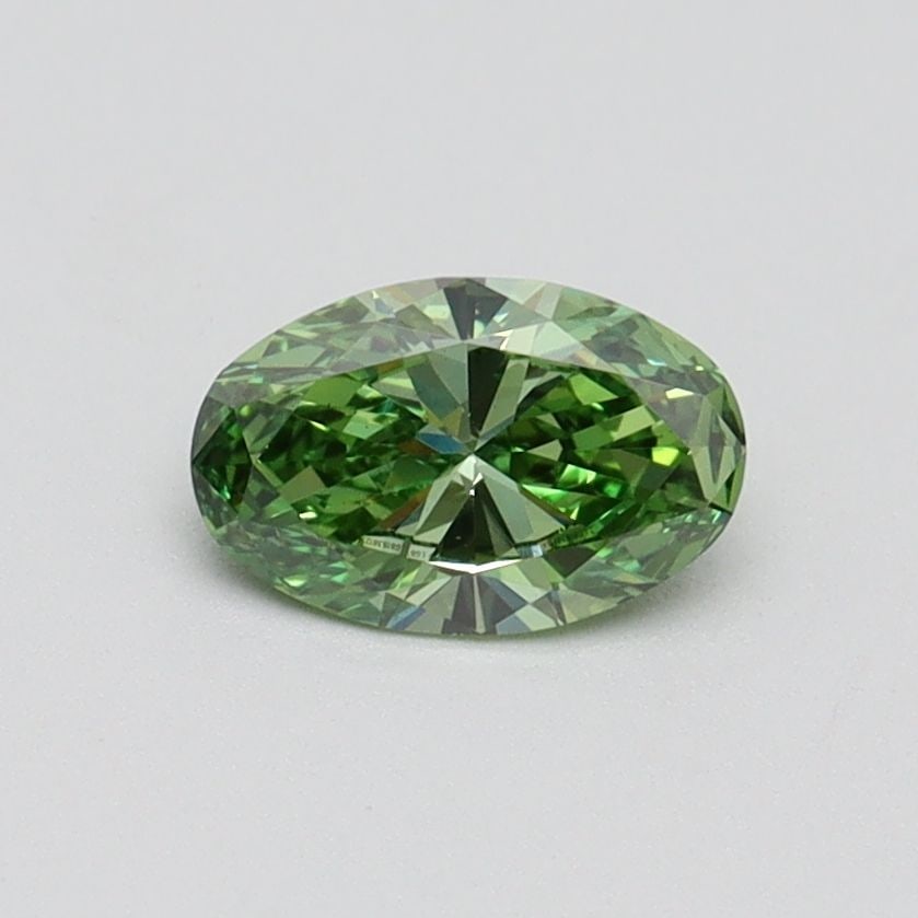 Loose Diamond - OVAL 0.5ct Fancy Vivid Green VS2: Loose Diamond - OVAL 0.5ct Fancy Vivid Green VS2 Source: This is a real non-mined Diamond that has been grown in a lab Shape: OVAL Carats: 0.5 Color: Fancy Vivid Green Certification: IGI Video: