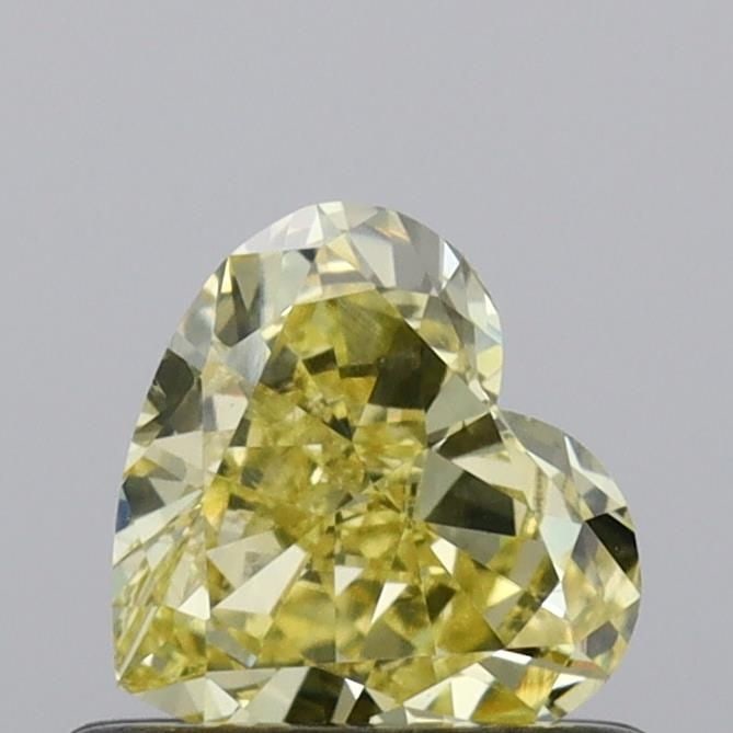 Loose Diamond - HEART 0.57ct Fancy Intense Yellow VS2: Loose Diamond - HEART 0.57ct Fancy Intense Yellow VS2 Source: This is a real non-mined Diamond that has been grown in a lab Shape: HEART Carats: 0.57 Color: Fancy Intense Yellow Certification: IGI Vid