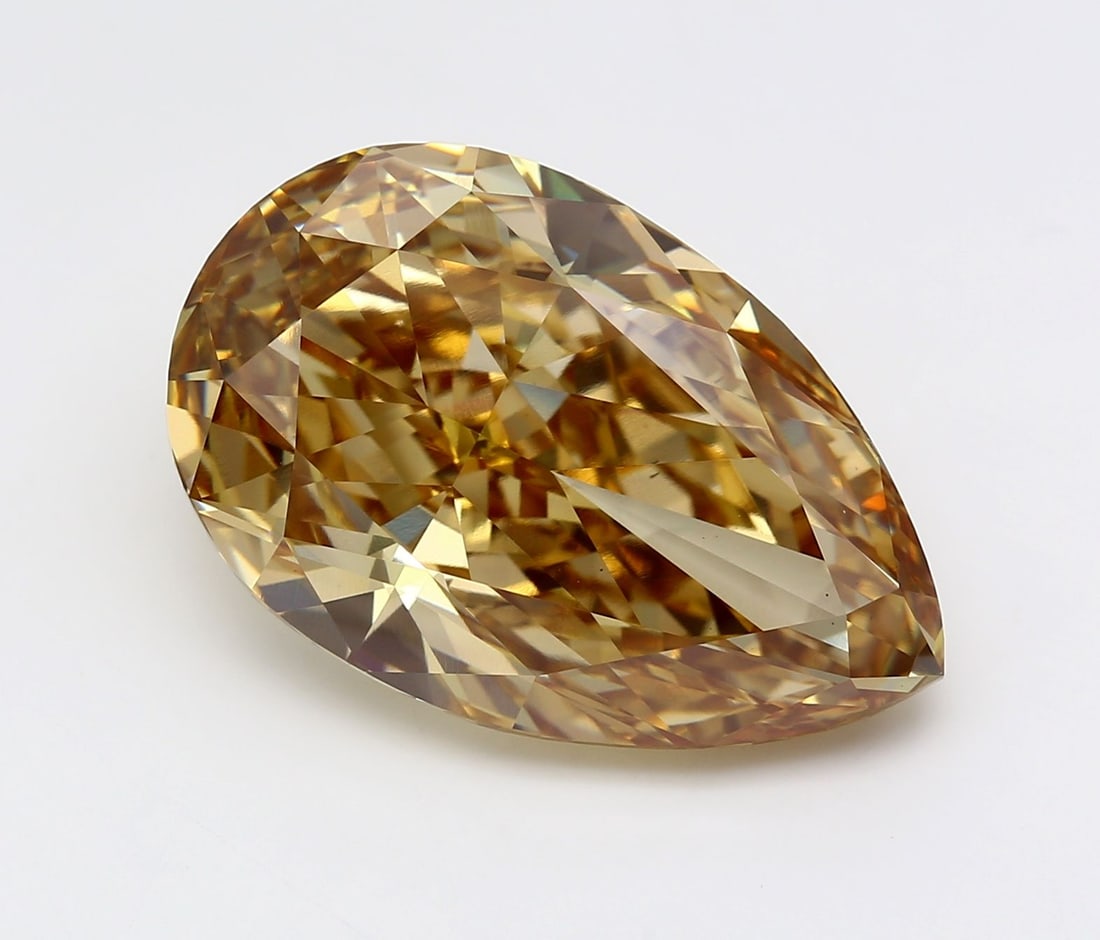 Loose Diamond - PEAR 20.49ct Fancy Intense Brown Yellow VS1: Loose Diamond - PEAR 20.49ct Fancy Intense Brown Yellow VS1 Source: This is a real non-mined Diamond that has been grown in a lab Shape: PEAR Carats: 20.49 Color: Fancy Intense Brown Yellow Certificat