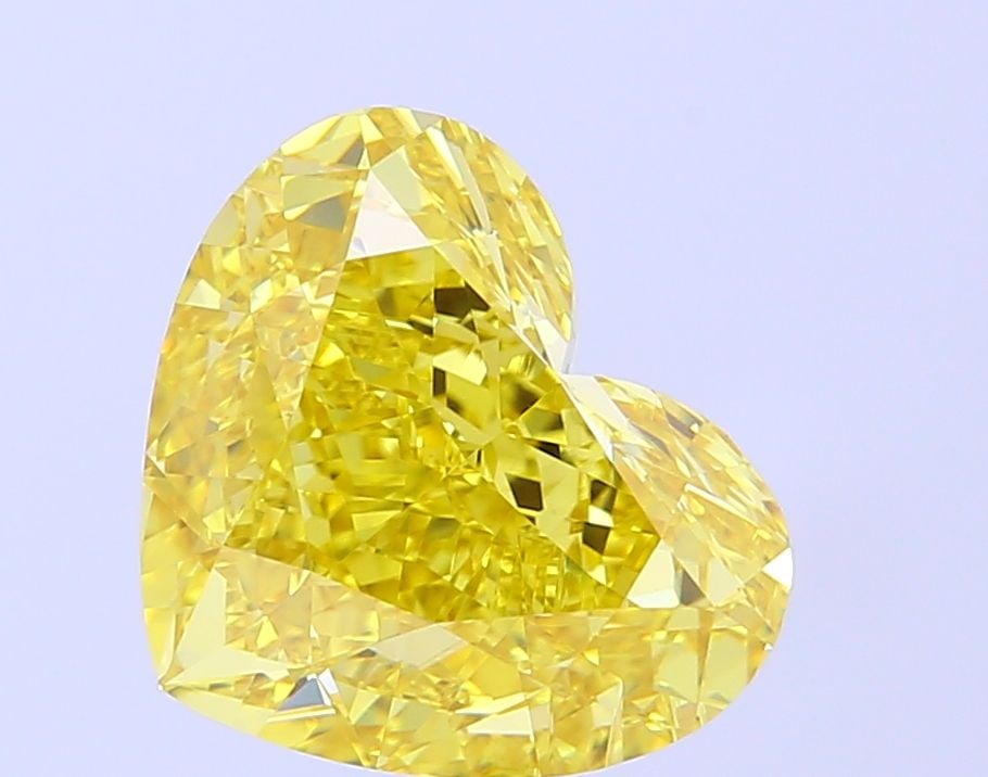 Loose Diamond - HEART 5.55ct Fancy Vivid Yellow VS1: Loose Diamond - HEART 5.55ct Fancy Vivid Yellow VS1 Source: This is a real non-mined Diamond that has been grown in a lab Shape: HEART Carats: 5.55 Color: Fancy Vivid Yellow Certification: IGI Video: