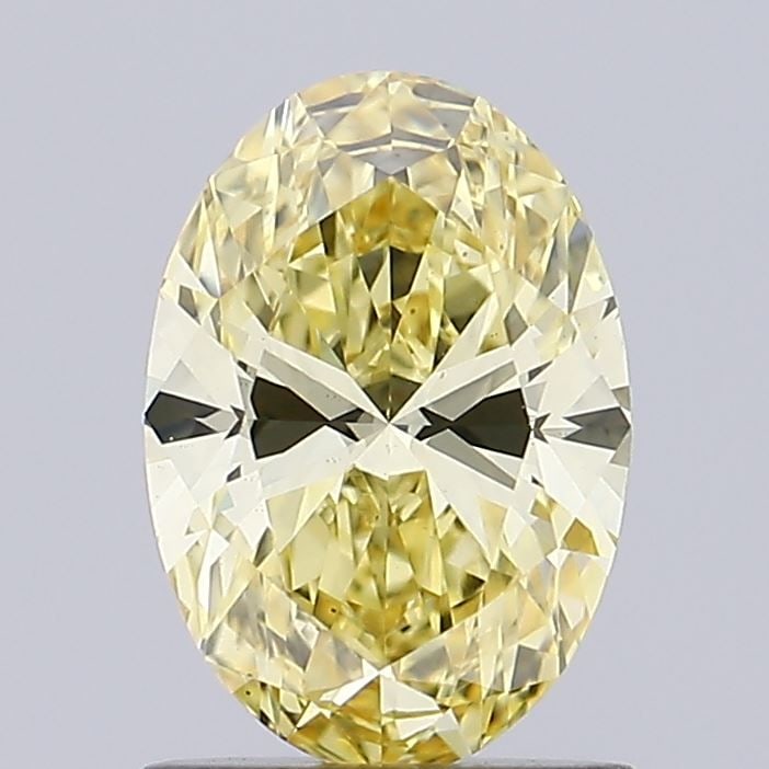Loose Diamond - OVAL 1.02ct Fancy Intense Yellow VS2: Loose Diamond - OVAL 1.02ct Fancy Intense Yellow VS2 Source: This is a real non-mined Diamond that has been grown in a lab Shape: OVAL Carats: 1.02 Color: Fancy Intense Yellow Certification: IGI Video