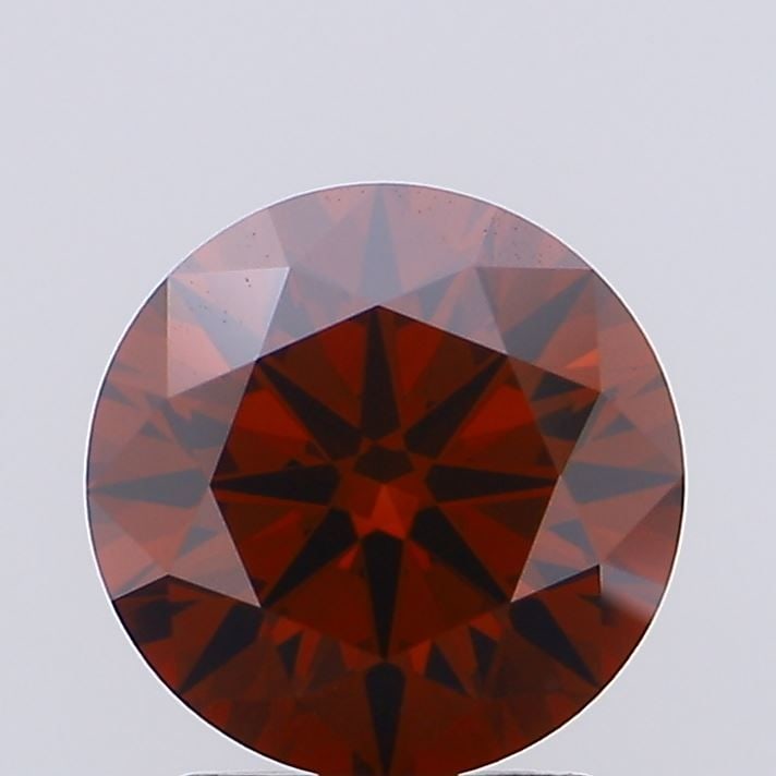 Ideal Loose Diamond - ROUND 1.34ct Fancy Deep Orange VVS2: Ideal Loose Diamond - ROUND 1.34ct Fancy Deep Orange VVS2 Source: This is a real non-mined Diamond that has been grown in a lab Shape: ROUND Carats: 1.34 Color: Fancy Deep Orange Certification: IGI Vi