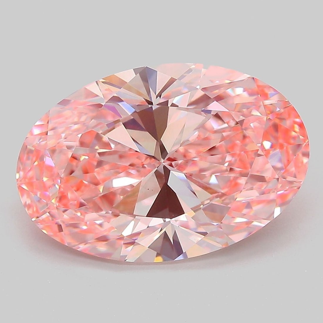 Loose Diamond - OVAL 7.01ct Fancy Vivid Pink VS1: Loose Diamond - OVAL 7.01ct Fancy Vivid Pink VS1 Source: This is a real non-mined Diamond that has been grown in a lab Shape: OVAL Carats: 7.01 Color: Fancy Vivid Pink Certification: IGI Video: