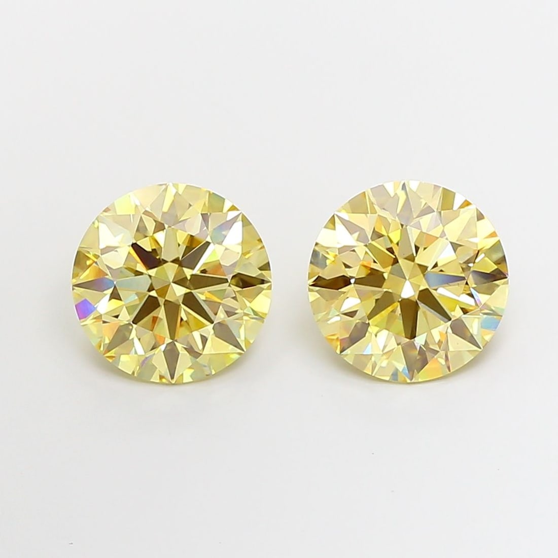 Ideal Loose Diamond - ROUND 5.02ct Fancy Light Yellow VS1: Ideal Loose Diamond - ROUND 5.02ct Fancy Light Yellow VS1 Source: This is a real non-mined Diamond that has been grown in a lab Shape: ROUND Carats: 5.02 Color: Fancy Light Yellow Certification: IGI V