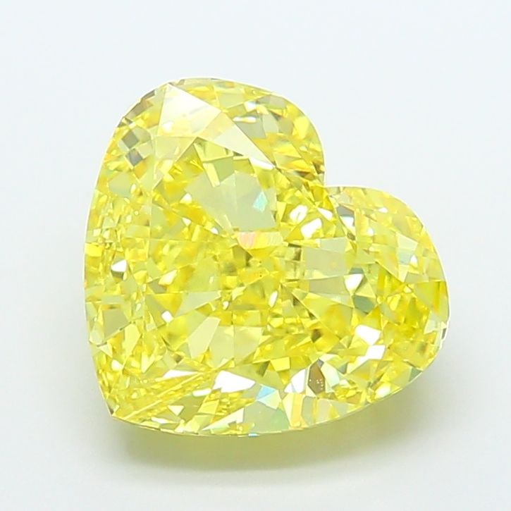 Loose Diamond - HEART 9.57ct Fancy Vivid Yellow VS1: Loose Diamond - HEART 9.57ct Fancy Vivid Yellow VS1 Source: This is a real non-mined Diamond that has been grown in a lab Shape: HEART Carats: 9.57 Color: Fancy Vivid Yellow Certification: IGI Video: