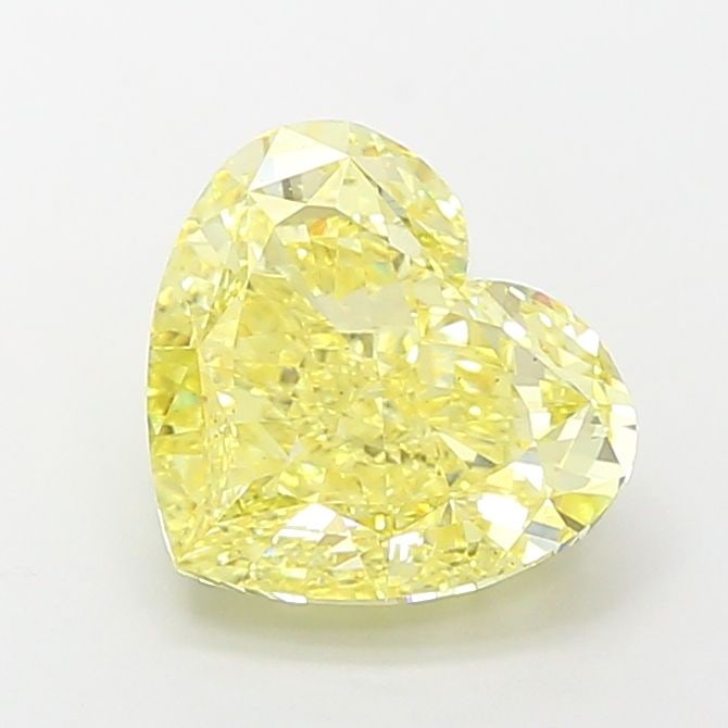 Loose Diamond - HEART 4.14ct Fancy Vivid Yellow VS2: Loose Diamond - HEART 4.14ct Fancy Vivid Yellow VS2 Source: This is a real non-mined Diamond that has been grown in a lab Shape: HEART Carats: 4.14 Color: Fancy Vivid Yellow Certification: IGI Video: