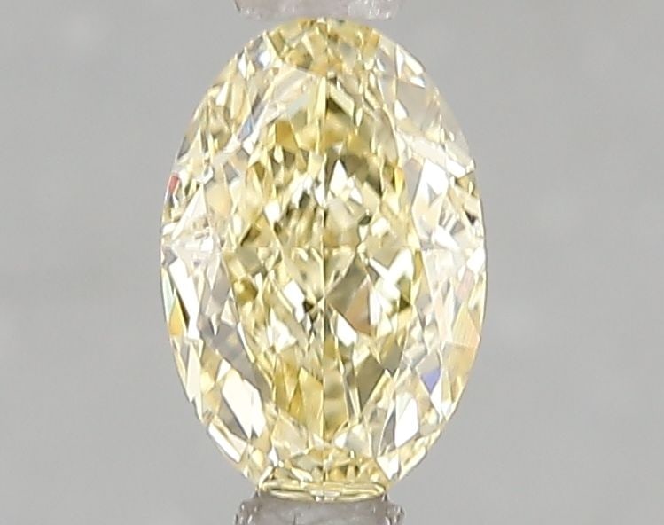 Loose Diamond - OVAL 1.0ct Fancy Intense Yellow VVS2: Loose Diamond - OVAL 1.0ct Fancy Intense Yellow VVS2 Source: This is a real non-mined Diamond that has been grown in a lab Shape: OVAL Carats: 1.0 Color: Fancy Intense Yellow Certification: IGI Video: