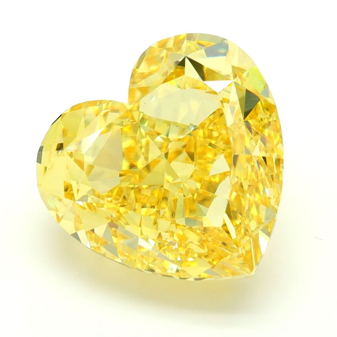 Loose Diamond - HEART 7.07ct Fancy Vivid Yellow VS1: Loose Diamond - HEART 7.07ct Fancy Vivid Yellow VS1 Source: This is a real non-mined Diamond that has been grown in a lab Shape: HEART Carats: 7.07 Color: Fancy Vivid Yellow Certification: IGI Video: