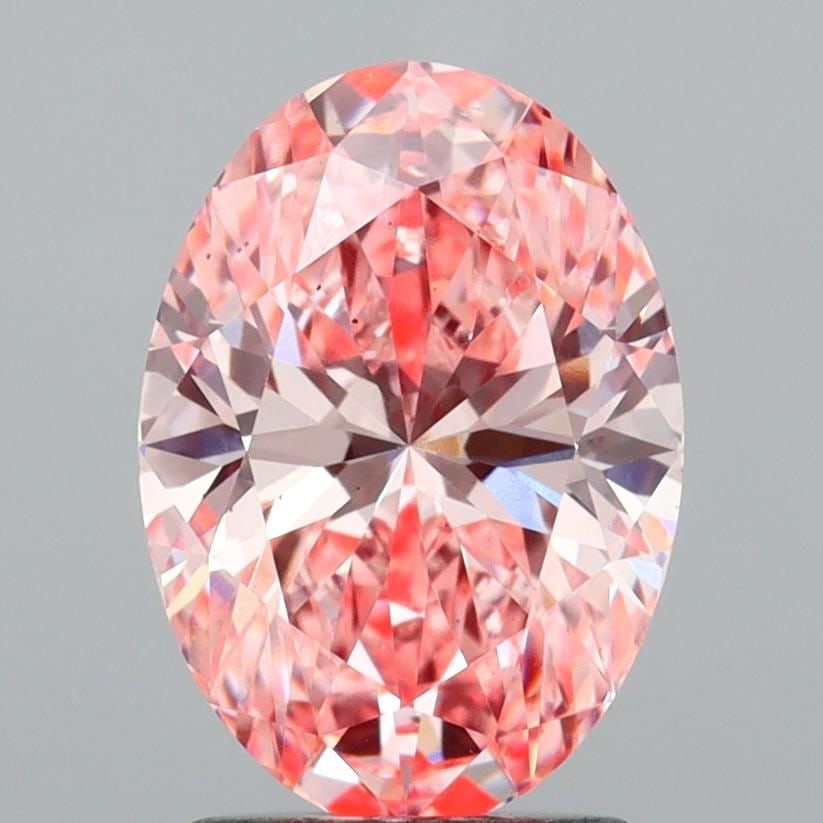Loose Diamond - OVAL 2.02ct Fancy Vivid Pink VS2: Loose Diamond - OVAL 2.02ct Fancy Vivid Pink VS2 Source: This is a real non-mined Diamond that has been grown in a lab Shape: OVAL Carats: 2.02 Color: Fancy Vivid Pink Certification: IGI Video: