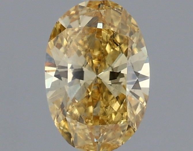 Loose Diamond - OVAL 0.46ct Fancy Intense Yellow VS2: Loose Diamond - OVAL 0.46ct Fancy Intense Yellow VS2 Source: This is a real non-mined Diamond that has been grown in a lab Shape: OVAL Carats: 0.46 Color: Fancy Intense Yellow Certification: IGI Video