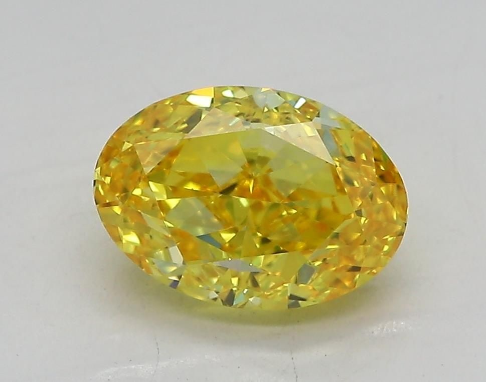 Loose Diamond - OVAL 1.53ct Fancy Vivid Yellow VVS2: Loose Diamond - OVAL 1.53ct Fancy Vivid Yellow VVS2 Source: This is a real non-mined Diamond that has been grown in a lab Shape: OVAL Carats: 1.53 Color: Fancy Vivid Yellow Certification: IGI Video: