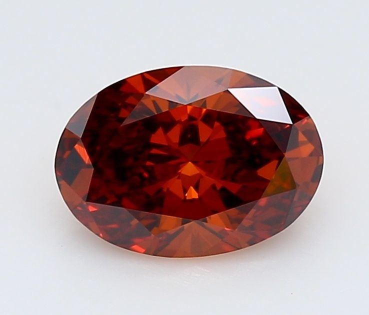 Loose Diamond - OVAL 0.65ct Fancy Deep Orange VS1: Loose Diamond - OVAL 0.65ct Fancy Deep Orange VS1 Source: This is a real non-mined Diamond that has been grown in a lab Shape: OVAL Carats: 0.65 Color: Fancy Deep Orange Certification: IGI Video: