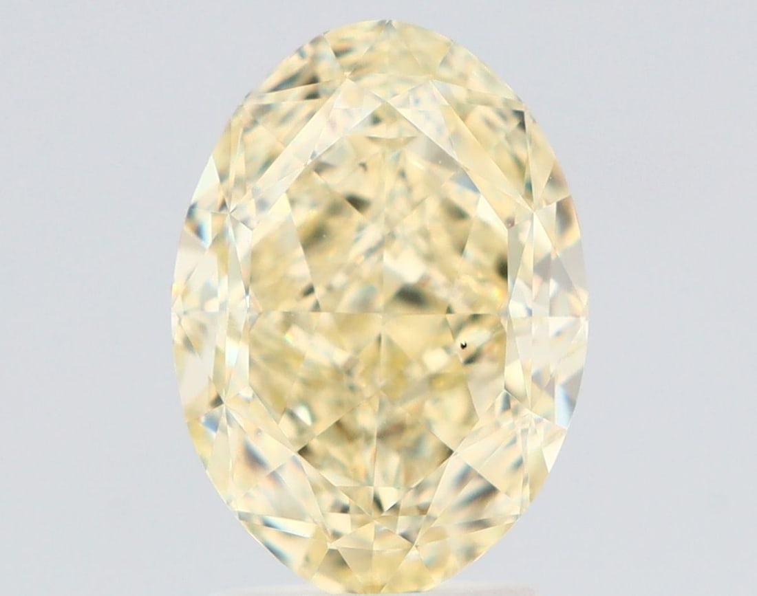 Loose Diamond - OVAL 3.02ct Fancy Light Yellow VS2: Loose Diamond - OVAL 3.02ct Fancy Light Yellow VS2 Source: Natural Shape: OVAL Carats: 3.02 Color: Fancy Light Yellow Certification: GIA Video: