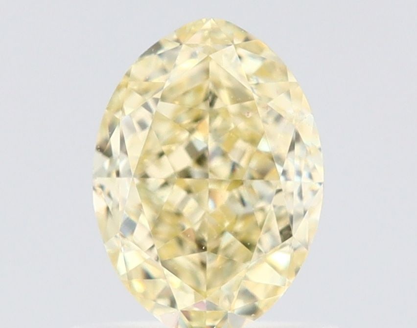 Loose Diamond - OVAL 1.02ct Fancy Light Yellow VVS2: Loose Diamond - OVAL 1.02ct Fancy Light Yellow VVS2 Source: Natural Shape: OVAL Carats: 1.02 Color: Fancy Light Yellow Certification: GIA Video: