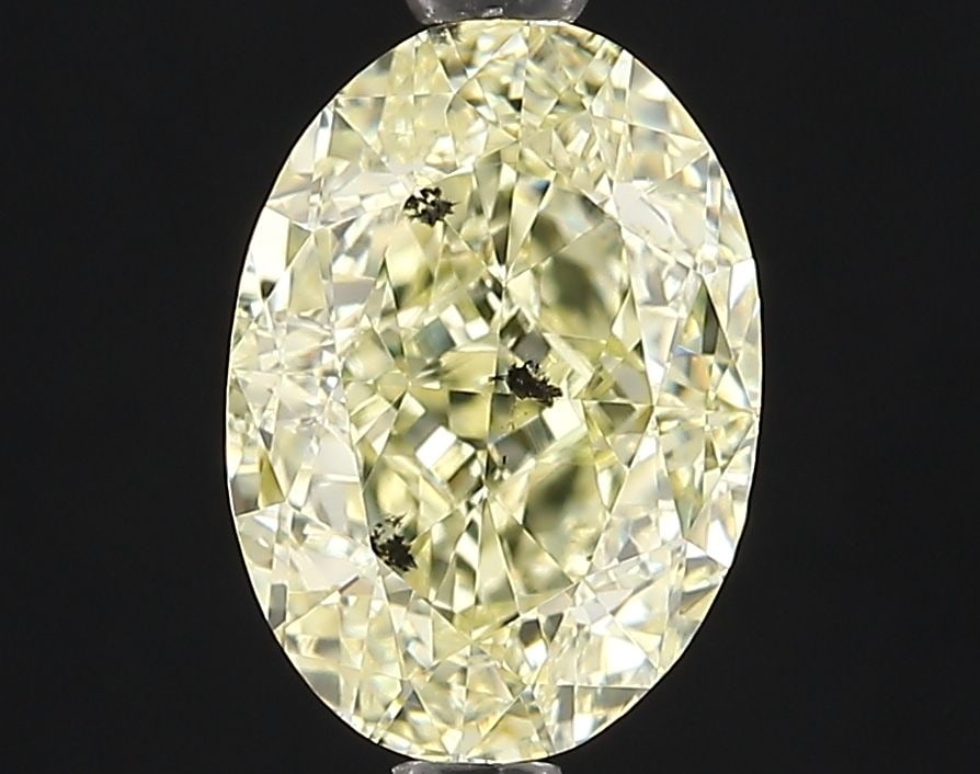 Loose Diamond - OVAL 1.64ct Fancy Light Yellow I1: Loose Diamond - OVAL 1.64ct Fancy Light Yellow I1 Source: Natural Shape: OVAL Carats: 1.64 Color: Fancy Light Yellow Certification: GIA Video: