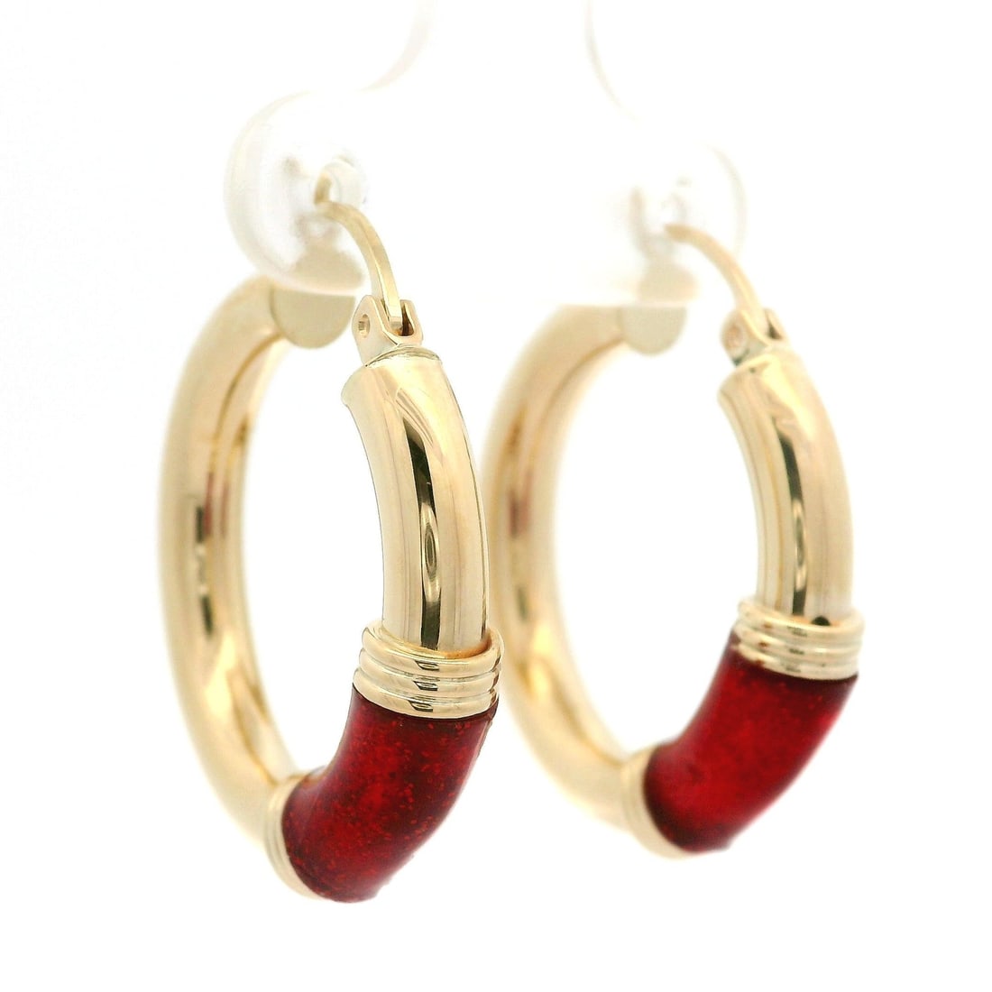 14k Yellow Gold Round Tube Hoop Earrings with Red Enamel: 14k Yellow Gold Round Tube Hoop Earrings with Red Enamel Elevate your accessory collection with these stunning Solid 14k Yellow Gold Round Tube Hoop Snap Earrings featuring intricate red enamel work. 