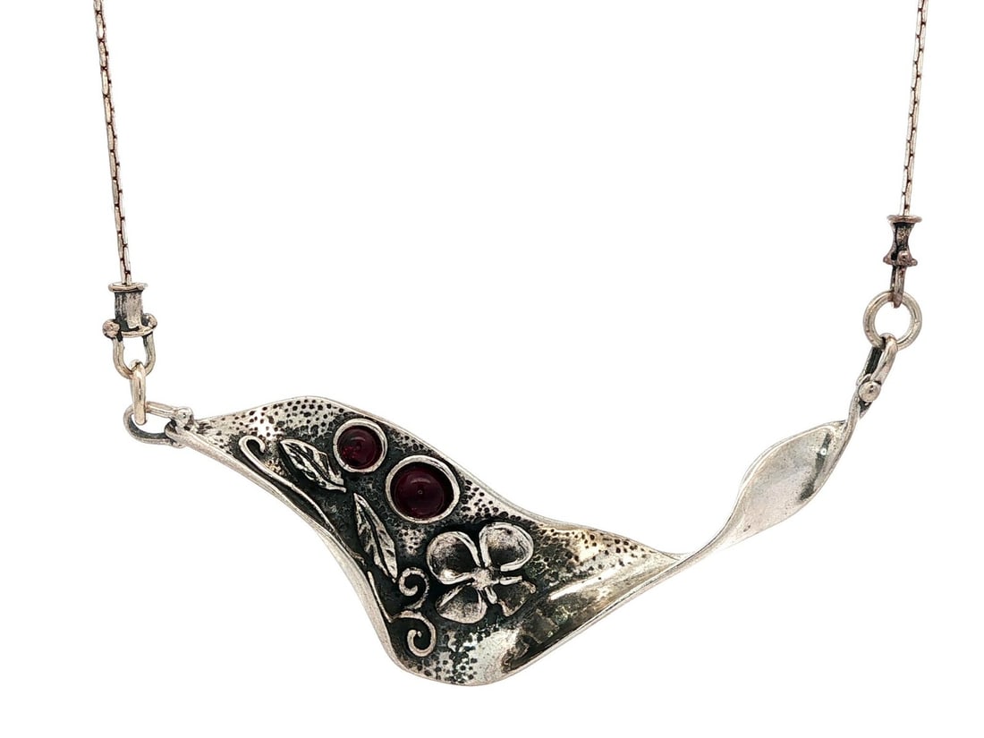 Handmade Sterling Silver Floral Pendant Necklace with Garnet: Handmade Sterling Silver Floral Pendant Necklace with Garnet This exquisite handmade pendant necklace features a stunning floral motif, crafted from high-quality sterling silver. Adorned with two natu