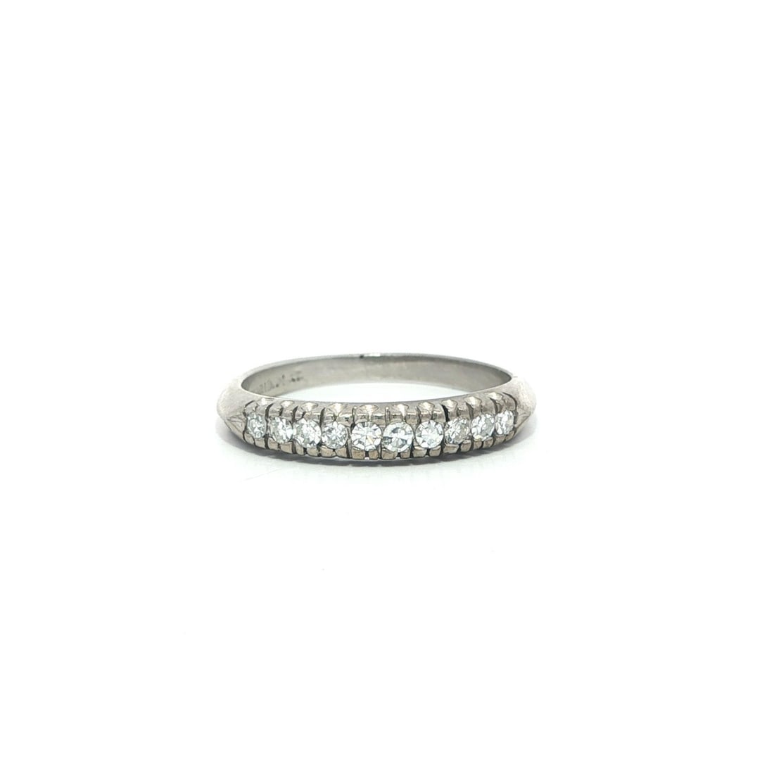 Platinum Palladium Stackable Band with .20ctw Natural Pave Diamonds Antique: Platinum Palladium Stackable Band with .20ctw Natural Pave Diamonds Antique This antique band ring features a single row of approximately 0.20 carats total weight of natural, old single cut white diam